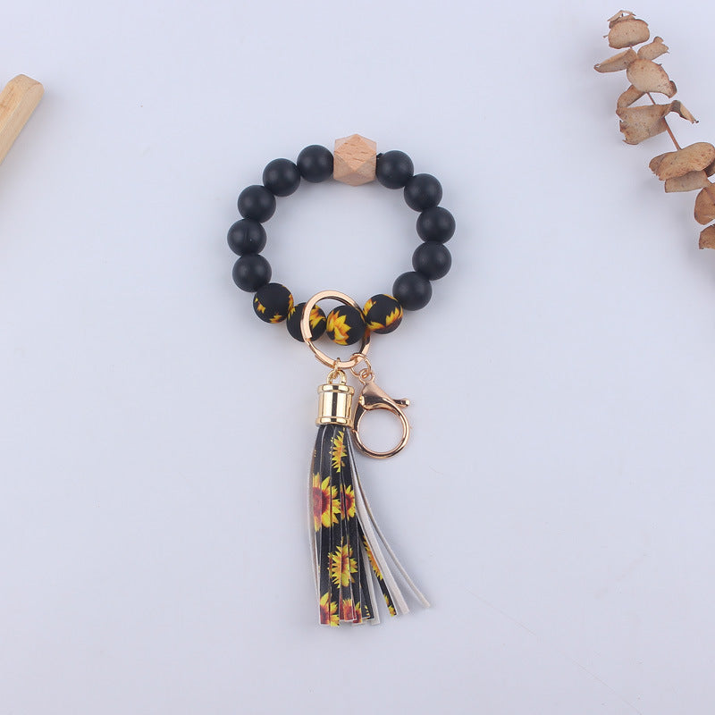 Wholesale Silicone Leather PU Short Tassel DIY Leopard Beaded Bracelet Keychains